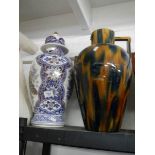 A large Oriental vase, a/f and one other.