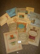 A mixed lot of cigarette card albums with contents including RAF badges, air raid precautions etc.,