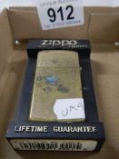 A boxed vintage Zippo lighter.