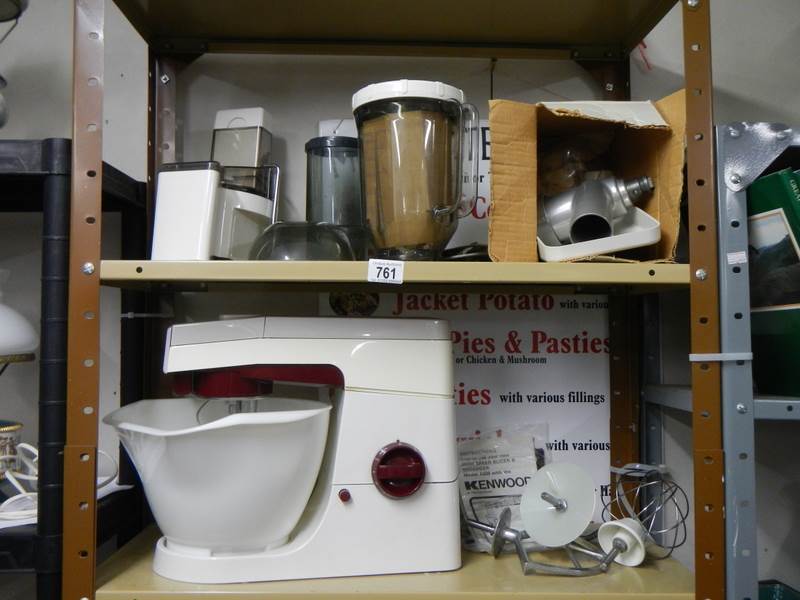 A Kenwood Chef excel food mixer with accessories including high speen slicer and shredder, No. A929.