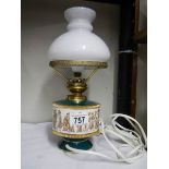 An Italian style ceramic table lamp with glass shade. 30 cm tall.