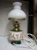 An Italian style ceramic table lamp with glass shade. 30 cm tall.
