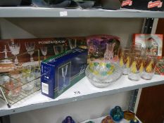A mixed lot of vintage glassware including Scottish scenes drinking set.