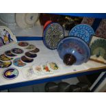 A mixed lot of Greek pottery including coasters, Guernsey pottery wall pocket etc.,