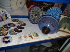 A mixed lot of Greek pottery including coasters, Guernsey pottery wall pocket etc.,