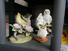 A Juliana collection barn owls and other ornaments.