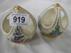 A pair of 'W Smith' porcelain posy baskets.