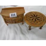 A miniature inlaid sideboard and table.