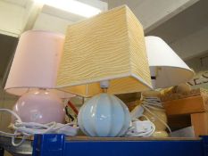 Three table lamps.