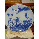 An early 20th century Chinese style blue and white plate.