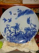 An early 20th century Chinese style blue and white plate.