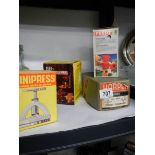 A boxed vintage Bel burger press, Speedy herb chopper etc.,