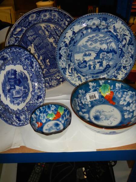 Two Chinese pottery bowls and three blue and white plates.