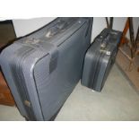 Two good quality suitcases.