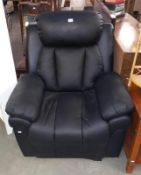 A black leather electric reclining arm chair