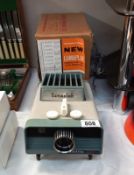 A boxed vintage Lumaplak 35mm slide projector