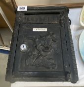 A cast iron wall mounted letter box (locked & no key)