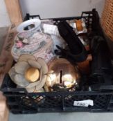 A box of miscellaneous items including a gilded skull money box, figure of Tin Tin