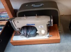 A vintage Sapphire sewing machine in case COLLECT ONLY