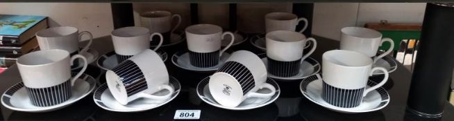 A Royal Osborne black and white tea set, (11 cups, 12 saucers)