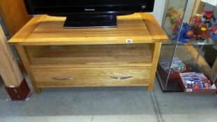 A solid oak television stand with drawer & shelf, COLLECT ONLY
