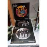 3 sealed 'The Beatles' LP sized round jigsaws