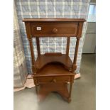 A pair of mahogany finished bedside tables