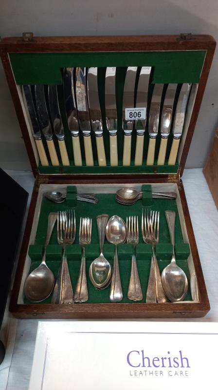 A boxed 46 piece cutlery set.