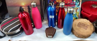 A quantity of water flasks and bottles