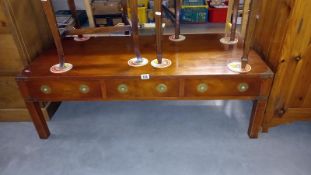 A dark wood stained Military style coffee table with brass corners, 122cm x 59cm x 41cm, COLLECT