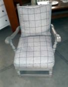 A shabby chic painted carver arm chair