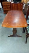 An Ercol two plank refectory table