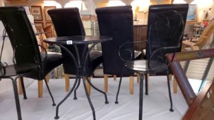 A black wrought iron garden table & chairs, COLLECT ONLY