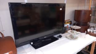 An LG 37" television with remote control COLLECT ONLY