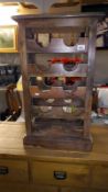 A teak bottle cabinet with wrought iron sides, 47cm x 29cm x 80cm COLLECT ONLY