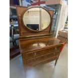 An Edwardian mirror back dressing table with flame mahogany drawer flanks