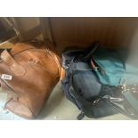 A quantity of bags including holdalls & handbag