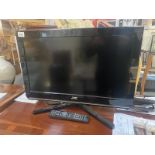 A JVC TV with remote control