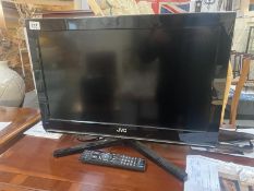A JVC TV with remote control