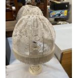 A pair of alabaster style base table lamps