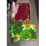 A box of material, curtains and 1970's sunflower tablecloth etc