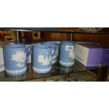 A quantity of Wedgwood tankards in boxes.