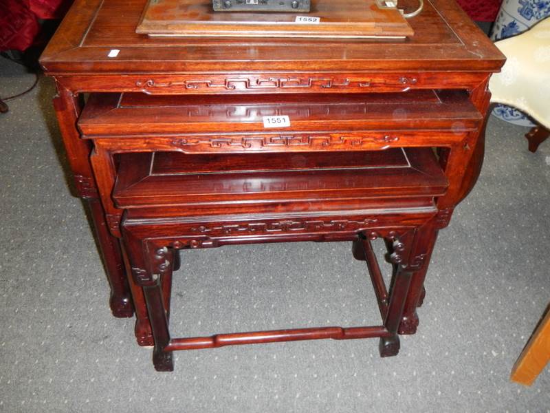 A good nest of three mahogany Chinese style tables, COLLECT ONLY.