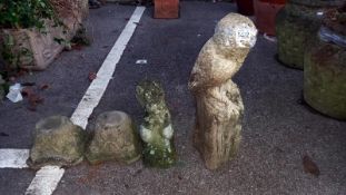 Four garden ornaments including two Corinthian tops, COLLECT ONLY.