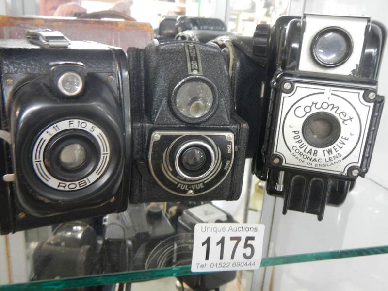 Three vintage camera's.