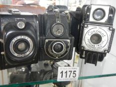 Three vintage camera's.