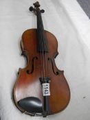 An old violin marked Antonio Stradivarius, Faciebol Anno 17.