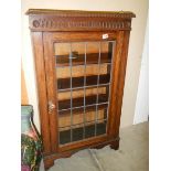 An Edwardian single door display cabinet, COLLECT ONLY.