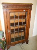 An Edwardian single door display cabinet, COLLECT ONLY.