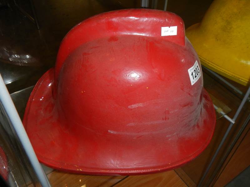 An old fireman's helmet. - Image 2 of 2